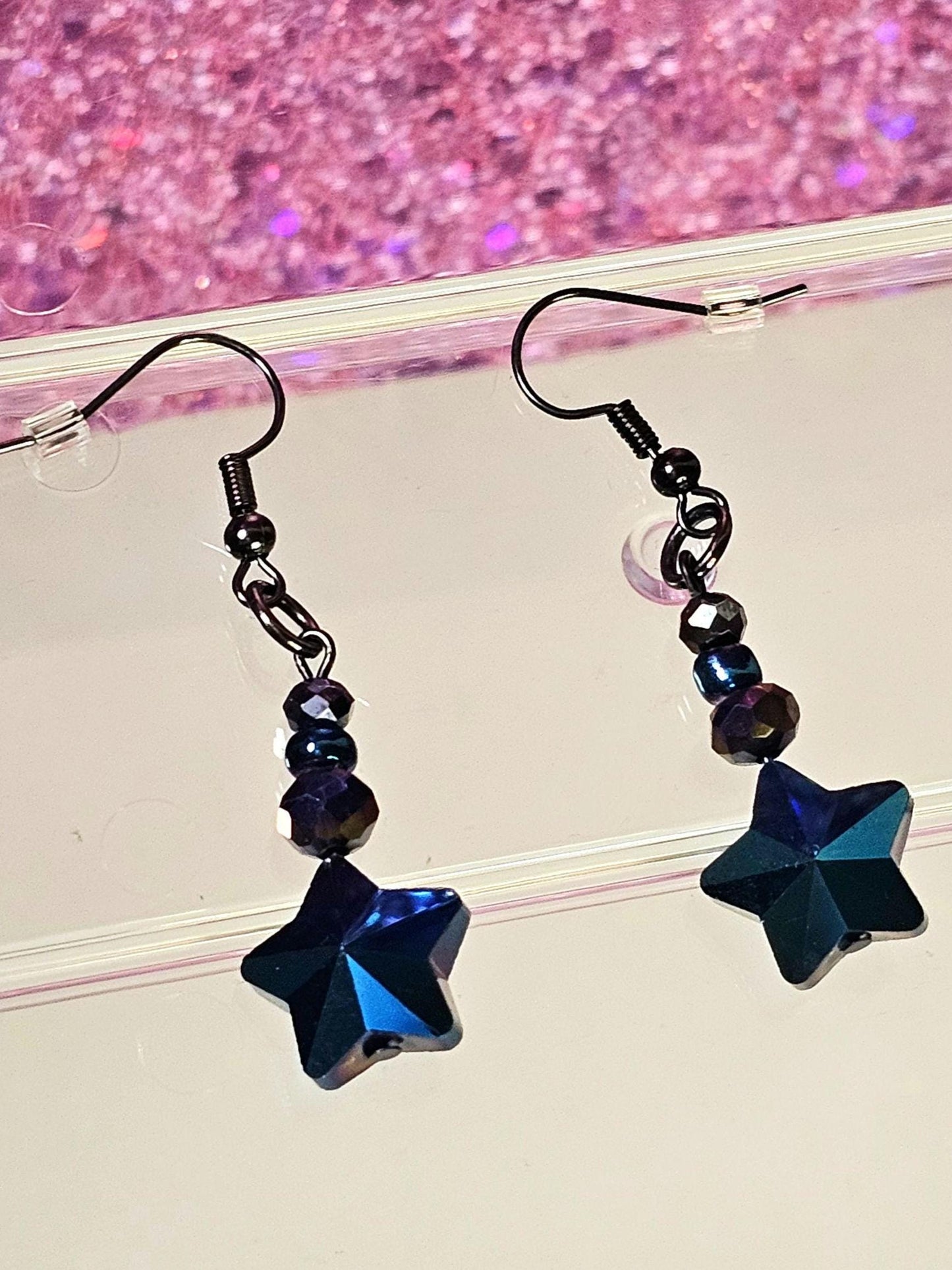 dark blue star earrings spooky jewelry